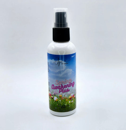 Spring Awakening Plus Room Spray bottle featuring sleek, modern design. Packed with Odouraze technology to neutralize malodours, the spray offers a fresh, clean scent inspired by fabric conditioners, blending aldehydes, citrus fruits, and florals. Perfect for creating a laundry-inspired ambiance
