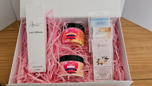 Packaged in a white magnetic box gift box you can select from our ranges of carefully crafted products to pamper your senses and provide the ultimate relaxation experience, this luxurious box set contains:

One of our inspired 100ml perfumes, with familiar fragrances from the top perfumers available.

A nourishing whipped soap and body butter to pamper your skin in a choice of your favourite fragrances.

Your choice of three delightfully scented wax melt snap bars to fill your home with the aromas of our am