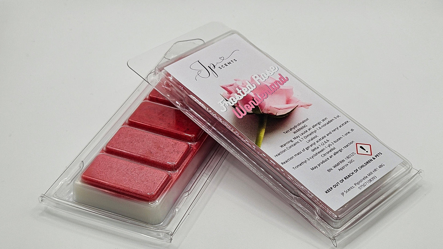 50g Frosted Rose Wonderland Wax Melt with an enchanting winter fragrance, inspired by popular hinch-style fabric conditioners, featuring notes of apple, peach, roses, frosted raspberries, and vanilla.