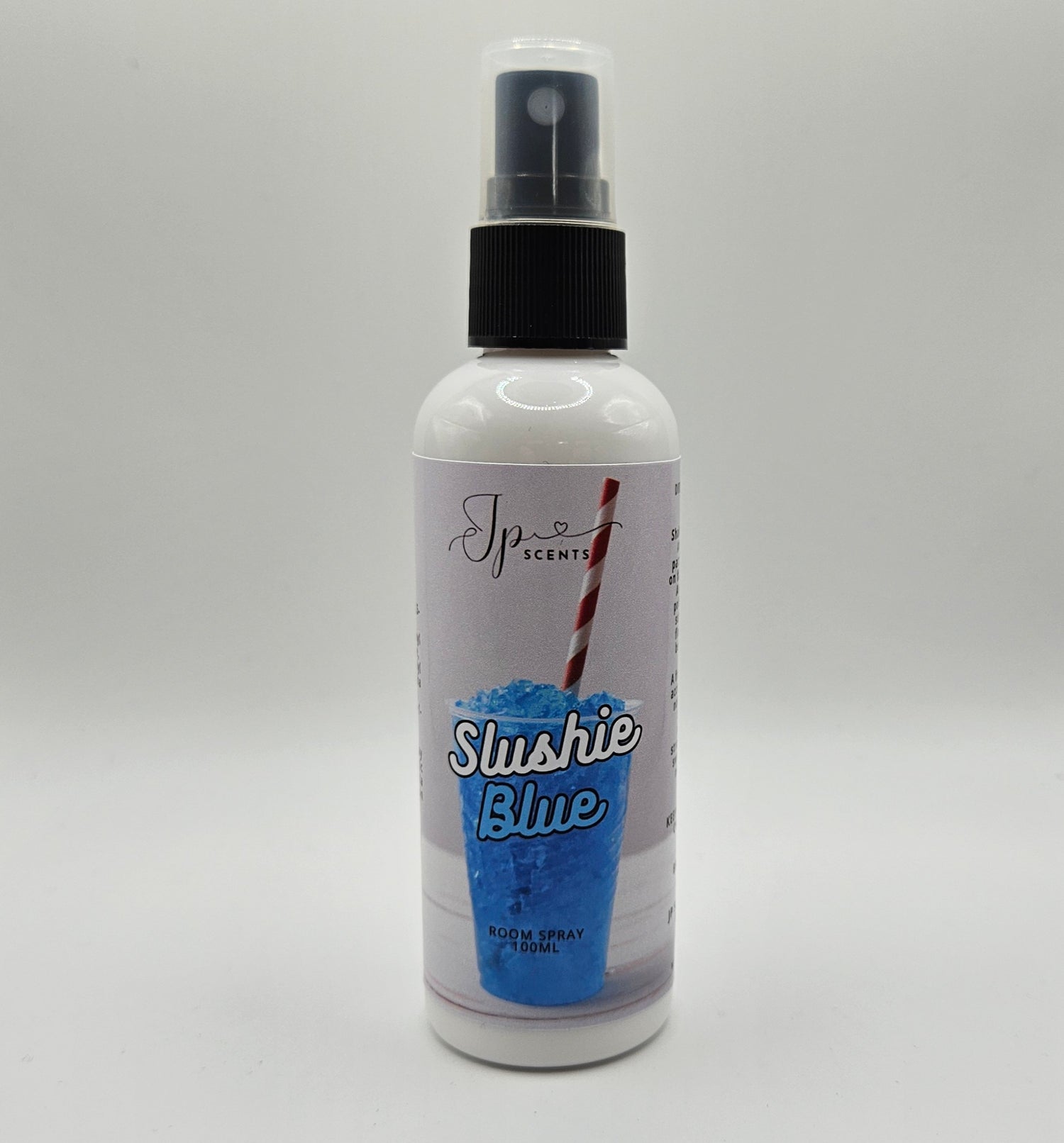 Slushie Blue Room Spray bottle featuring a refreshing summer fruit scent with notes of blueberry, raspberry, strawberry, and creamy vanilla, displayed in vibrant branding.