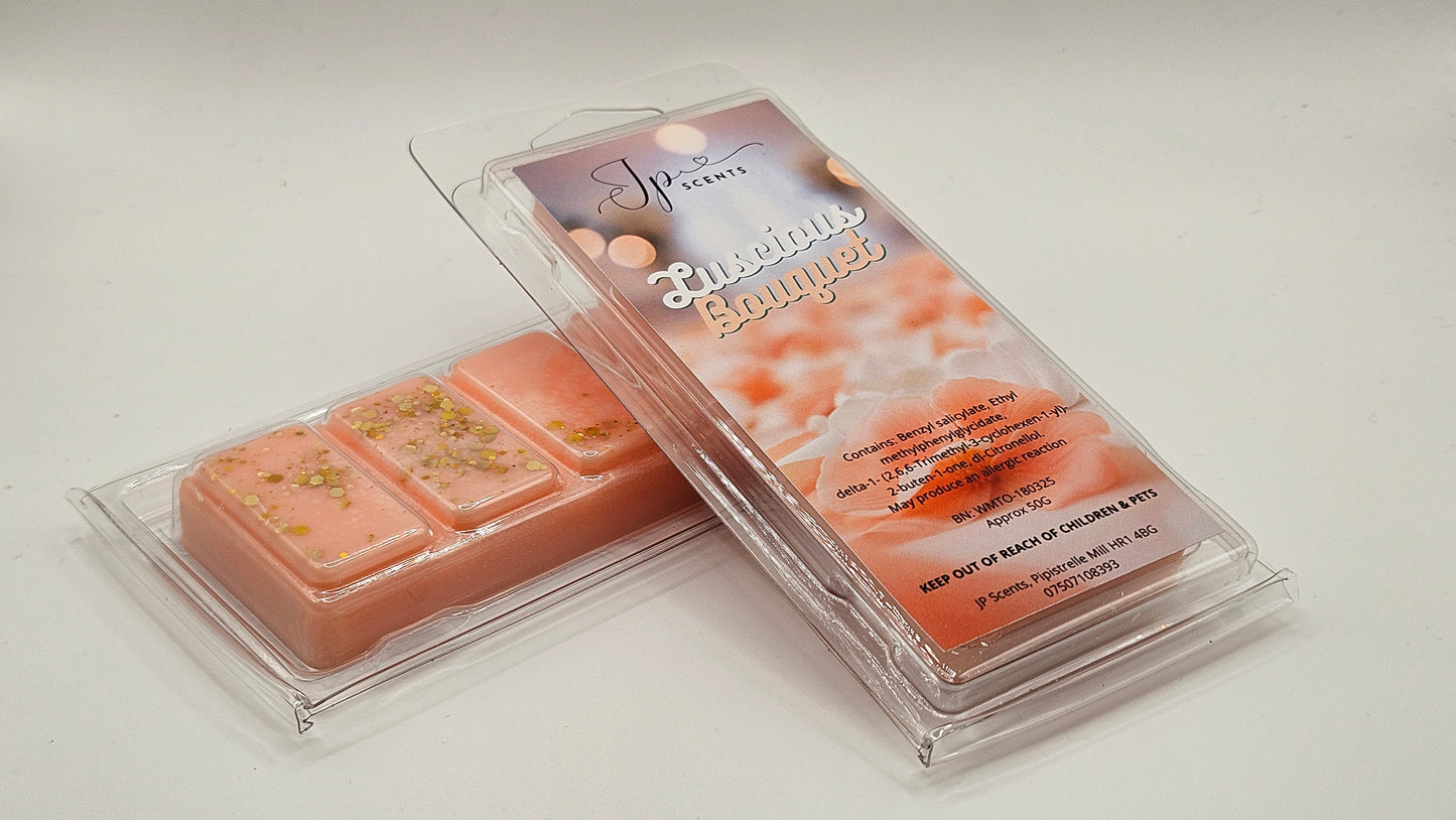 50g Snap Bar Luscious Bouquet Wax Melt showcasing vibrant peach, raspberry, and apple fruits complemented by delicate floral notes of violet, jasmine, freesia, and rose. A luxurious sweet base of vanilla, sandalwood, coconut, and musk completes this elegantly layered wax melt fragrance.
